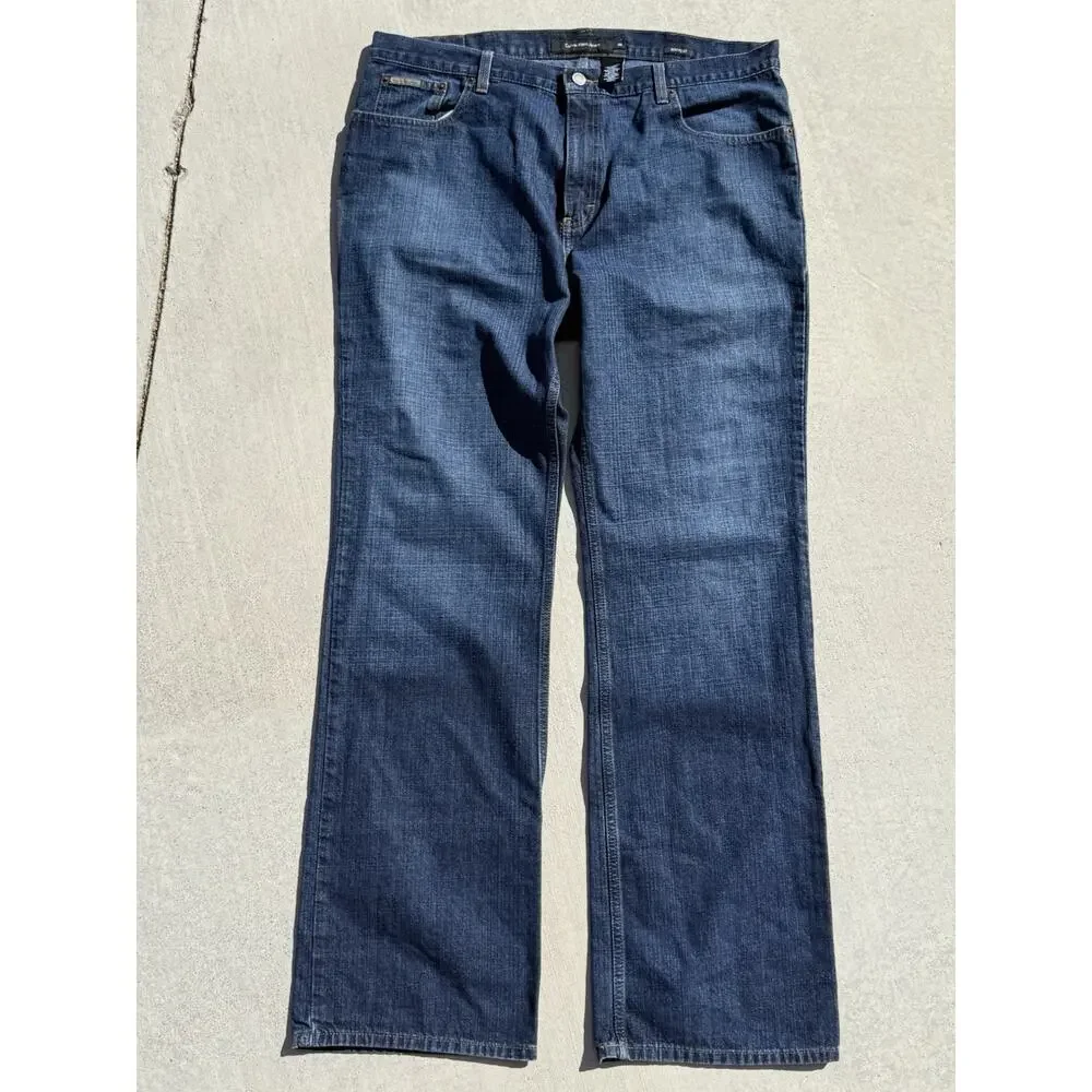 Calvin Klein Jeans Straight-Leg Indigo Denim With Brown Patch